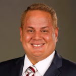 An intelligent business man smiling