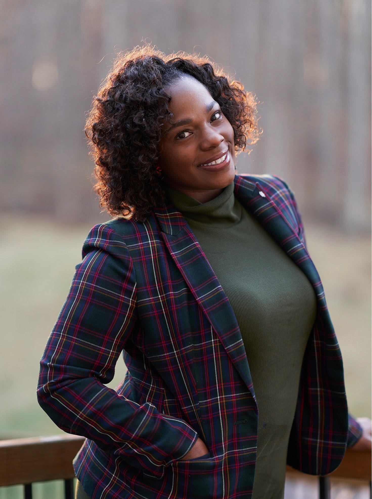 woman standing in front of a railing